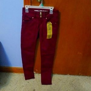 Burgundy skinny jeans